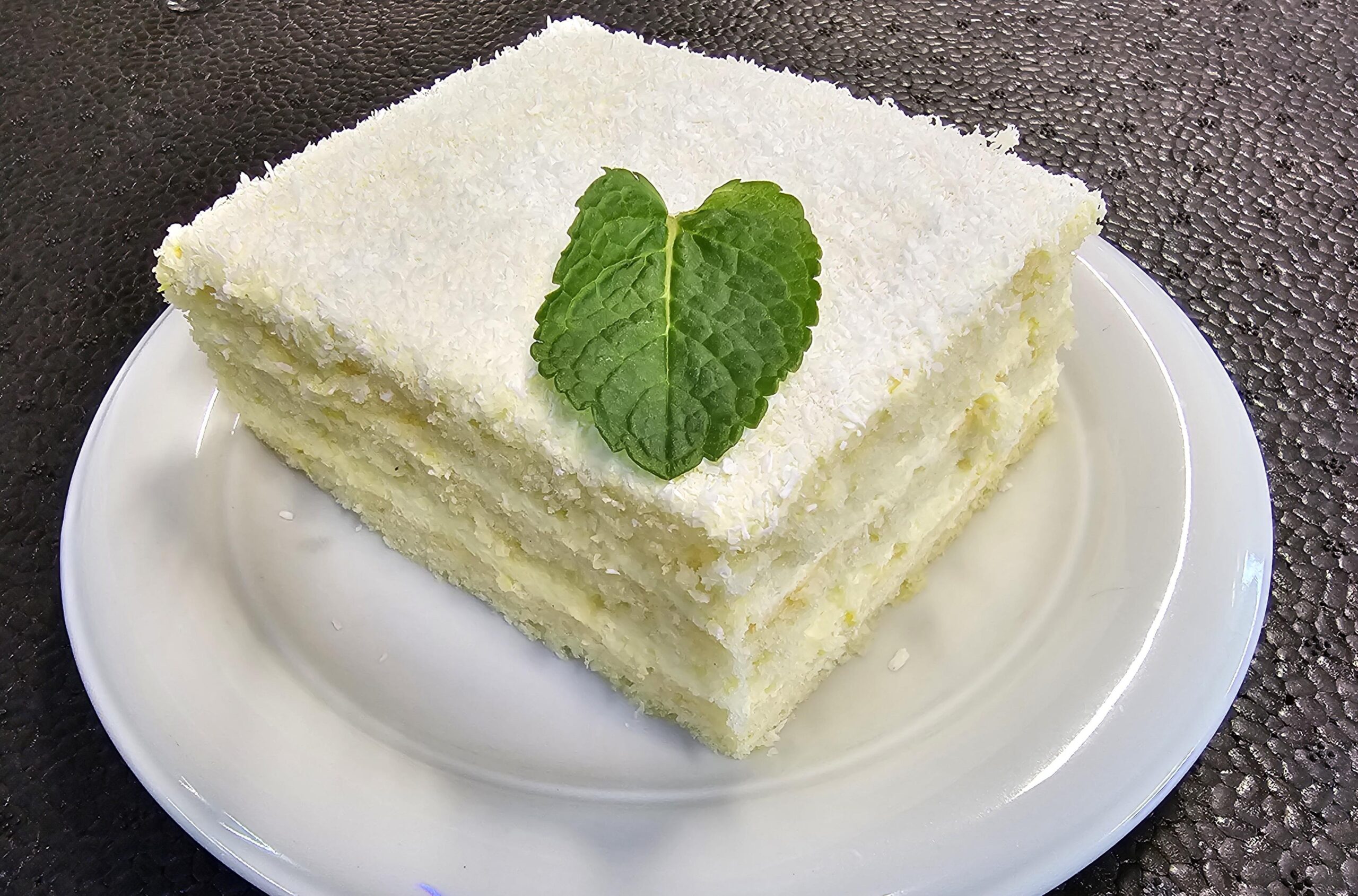 D1 - PRĂJITURĂ LĂMÂIȚA (făină, zahăr, unt, lapte, ouă, lămâie) 150 gr.